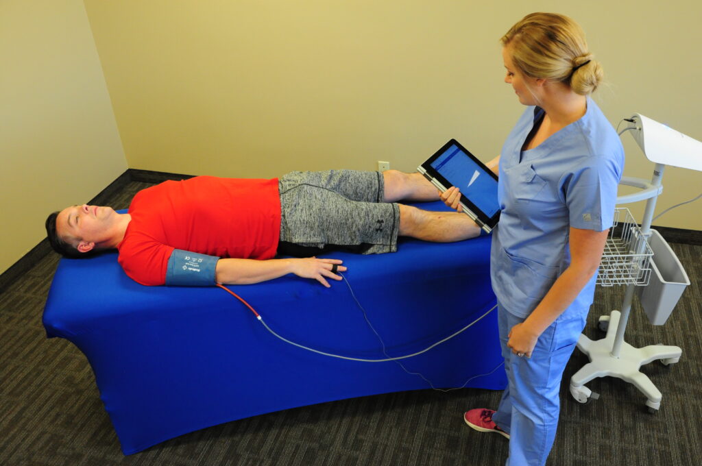 patient laid on bed with nurse